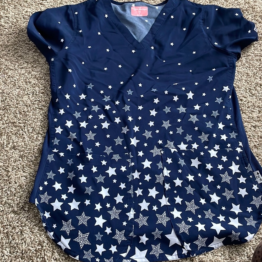 Navy scrub top with white stars